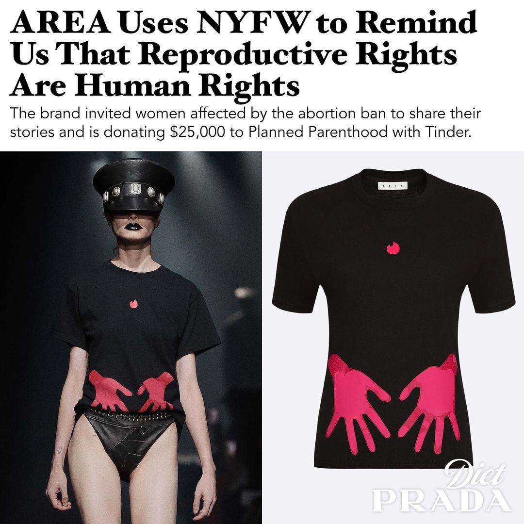 Promotional image featuring a model wearing a black AREA T-shirt with pink handprints and a small pink icon, highlighting a message about reproductive rights during New York Fashion Week. The headline reads, 'AREA Uses NYFW to Remind Us That Reproductive Rights Are Human Rights.' Text below explains that the brand invited women affected by abortion bans to share their stories and partnered with Tinder to donate $25,000 to Planned Parenthood. On the right, a close-up of the T-shirt shows the pink handprint design in detail, with 'Diet Prada' branding in the corner.